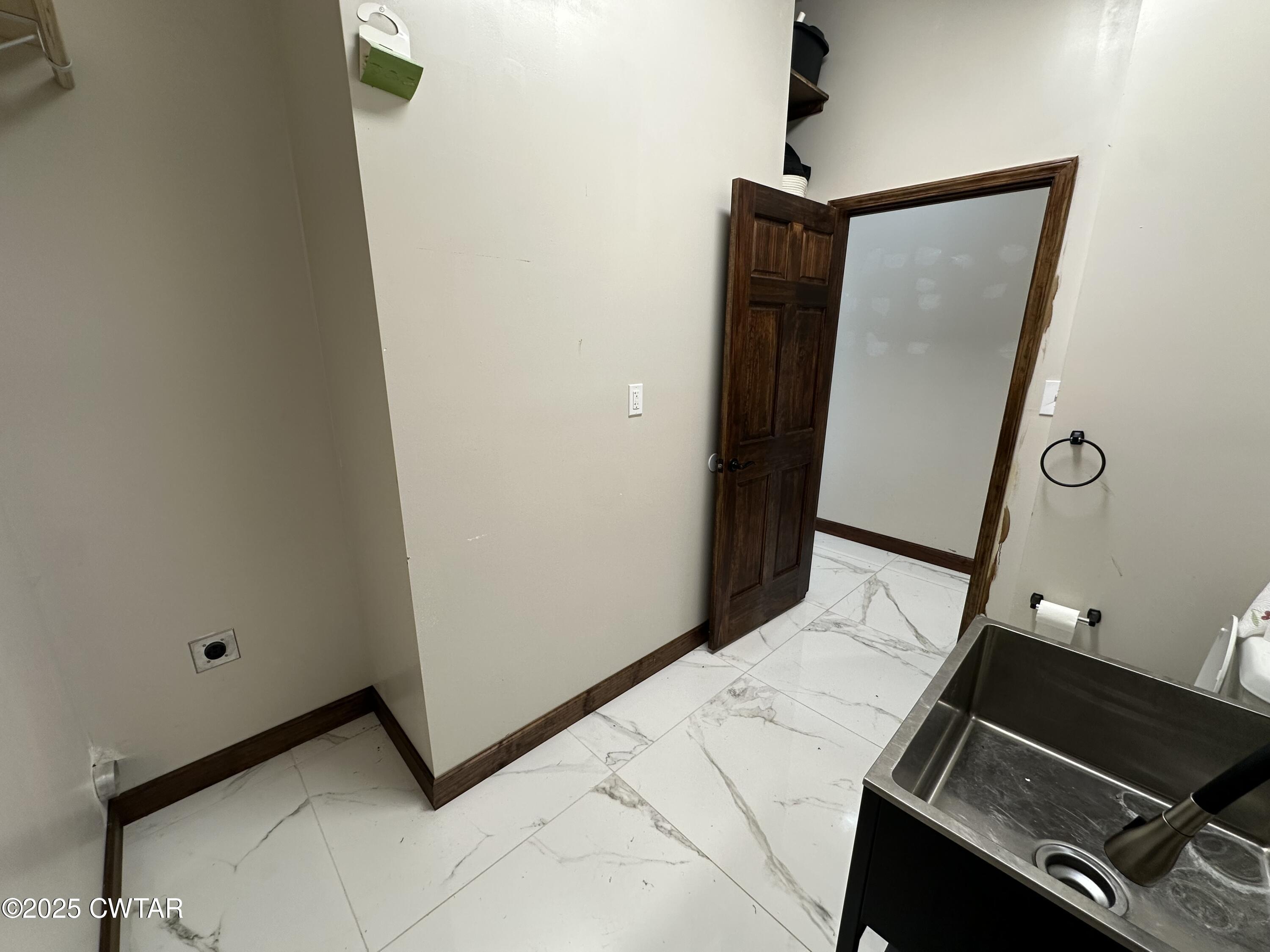 273 Fletcher Road Dyer, TN 38330 - Photo 9 of 46 a view of kitchen and hallway