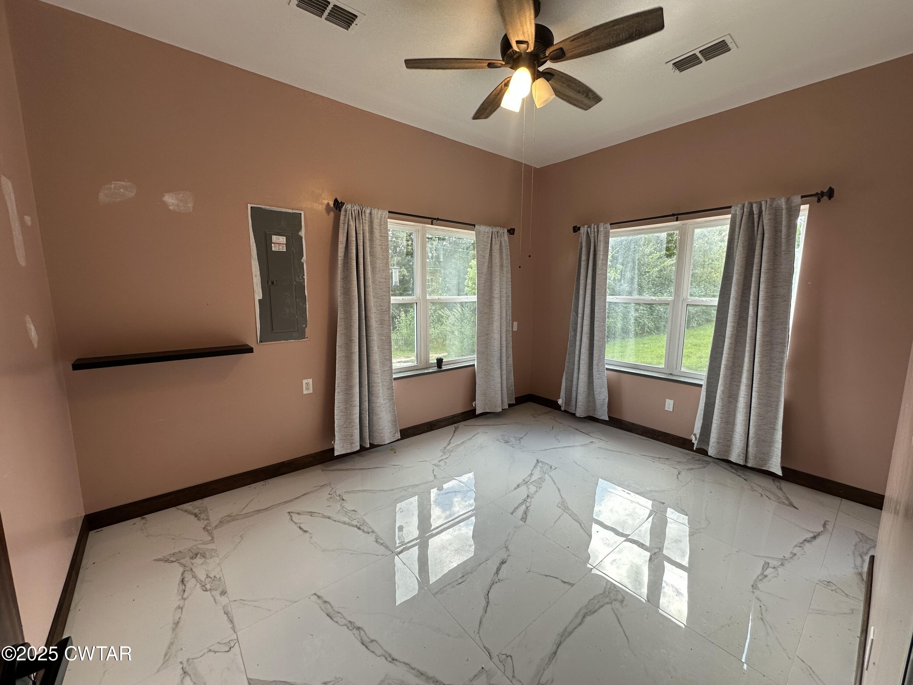 273 Fletcher Road Dyer, TN 38330 - Photo 10 of 46 a view of an empty room with a window