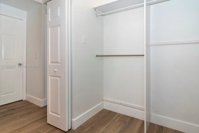 a view of small space with wooden floor