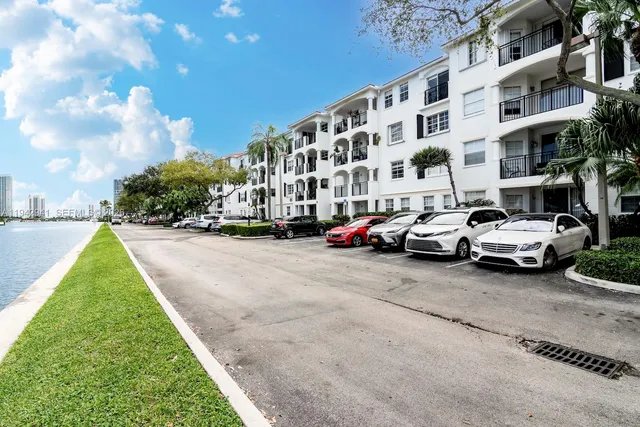 a buildings view with a car parked