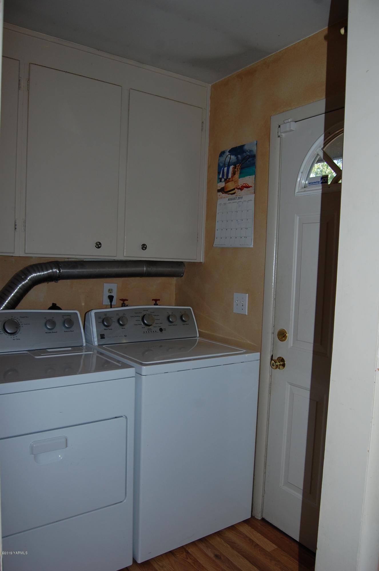 2710 Nelson Road Yakima, WA 98903 - Photo 12 of 30 a room with storage and utility