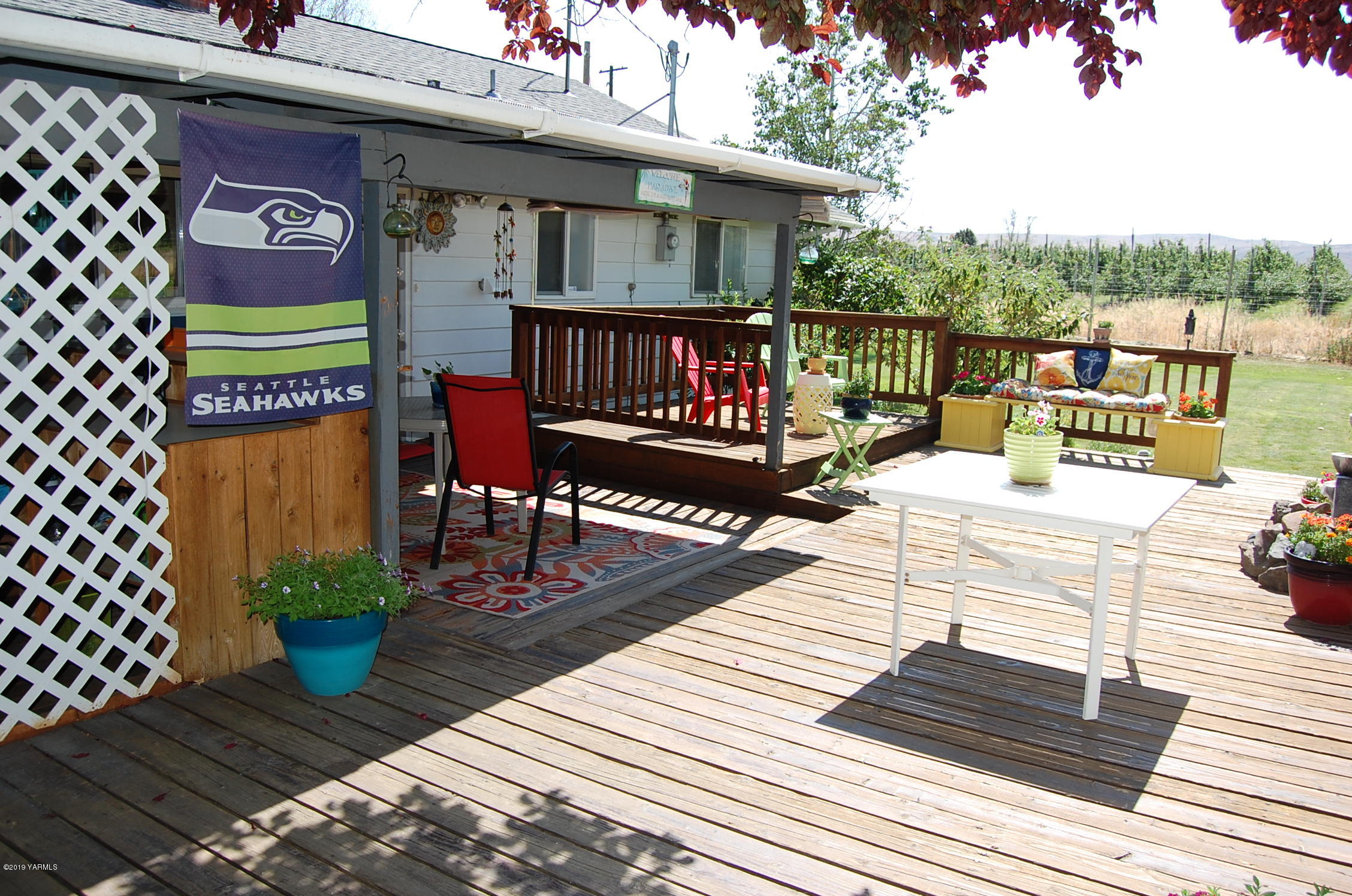2710 Nelson Road Yakima, WA 98903 - Photo 22 of 30 a view of a chairs on the deck