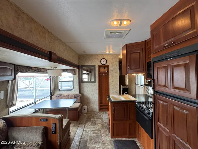 a view of a backyard with large trees