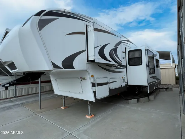 a backyard of a house with a yard and seating space