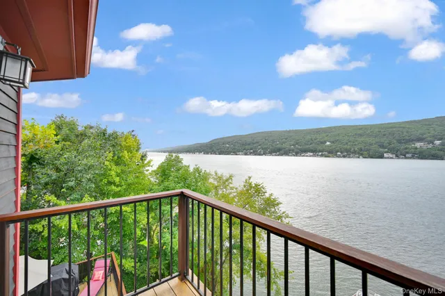 a view of a balcony with lake view