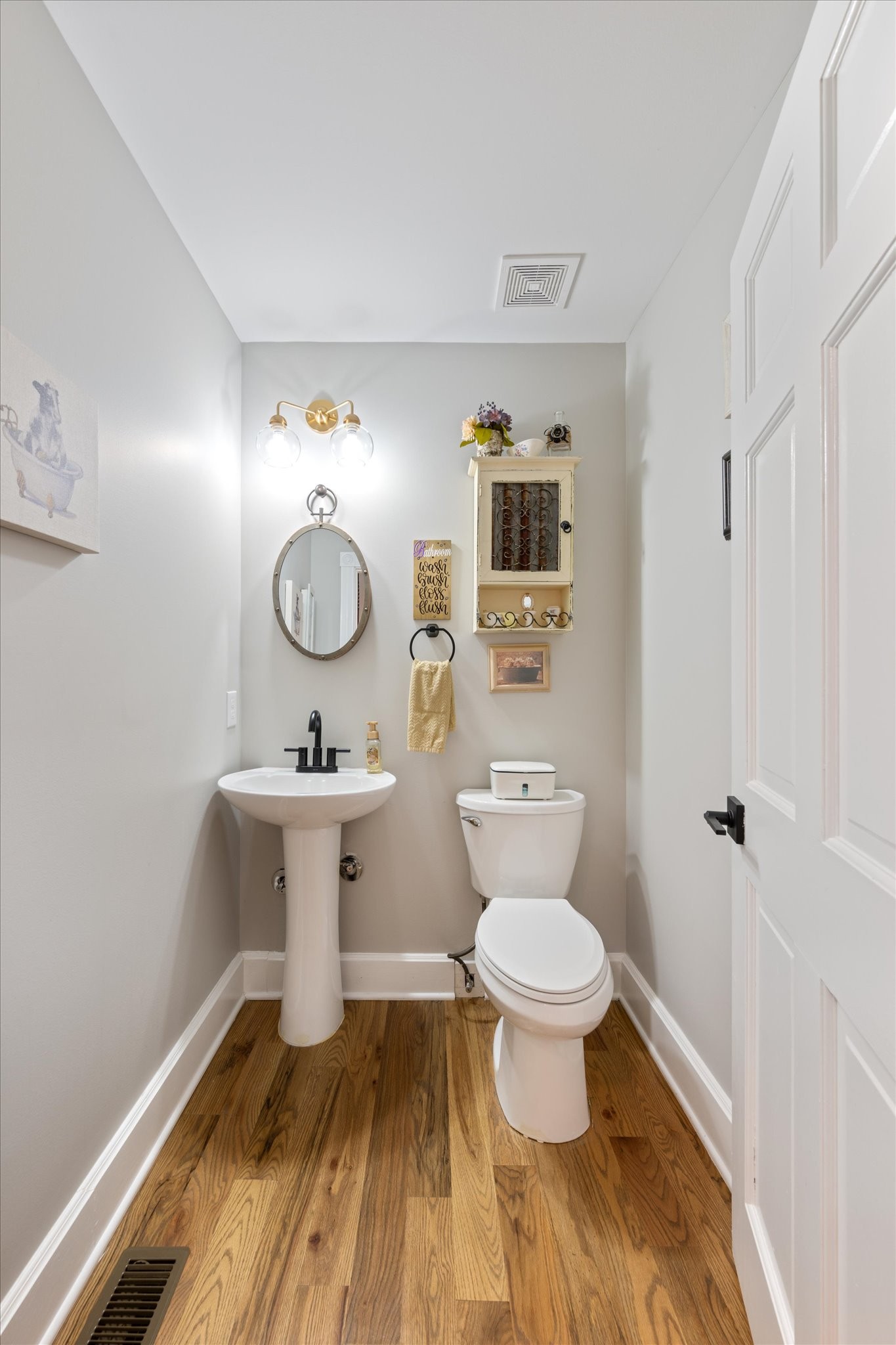 6395 Huffman Road Goodlettsville, TN 37072 - Photo 13 of 38 a bathroom with a sink toilet and a mirror
