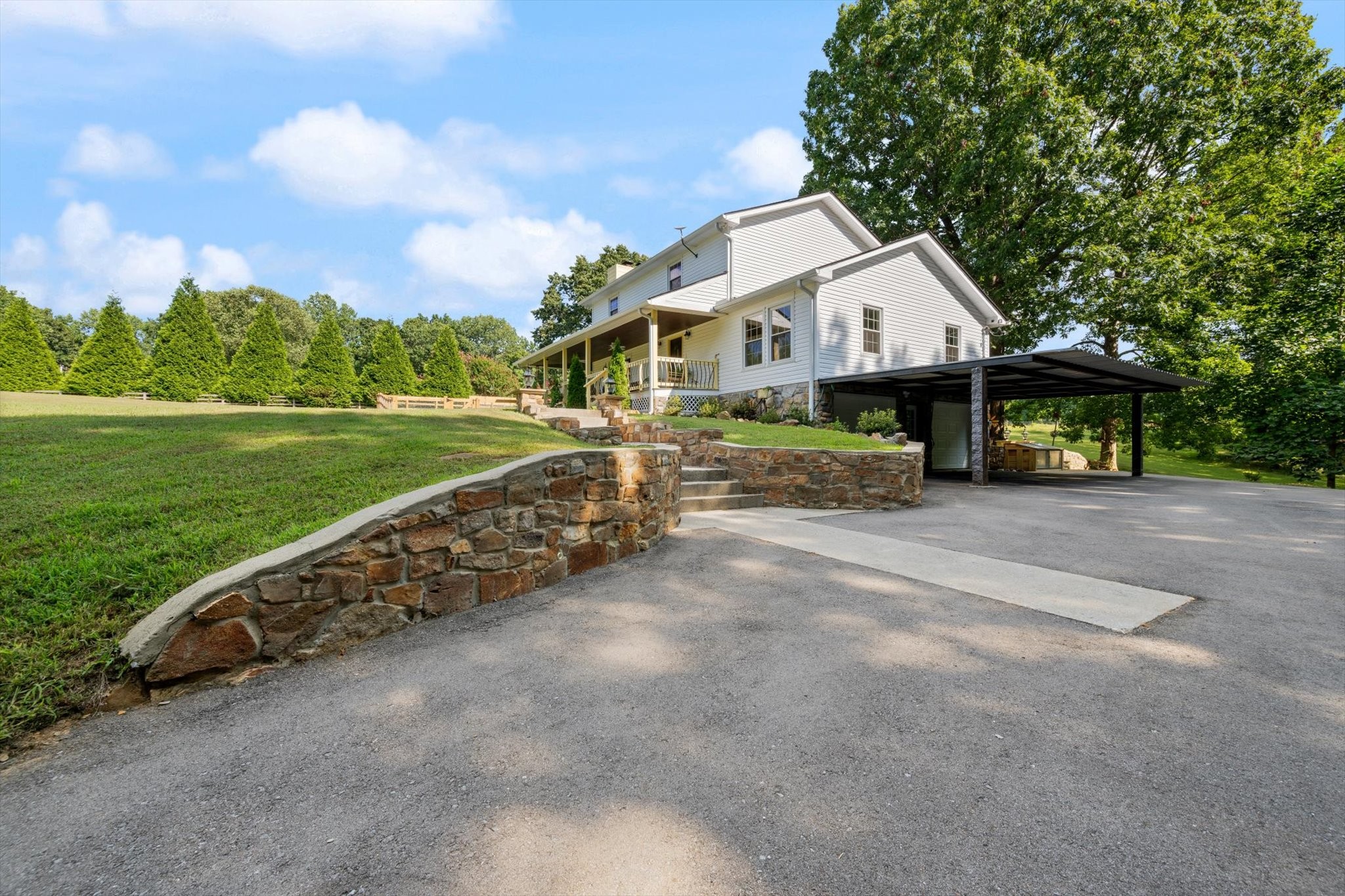 6395 Huffman Road Goodlettsville, TN 37072 - Photo 26 of 38 a front view of a house with garden