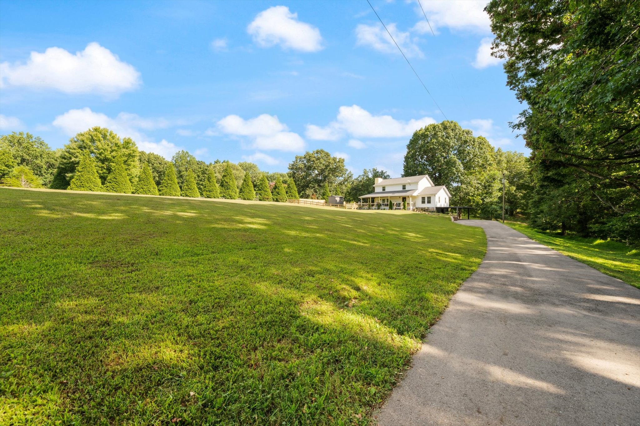 6395 Huffman Road Goodlettsville, TN 37072 - Photo 28 of 38 a view of a golf course with a lake
