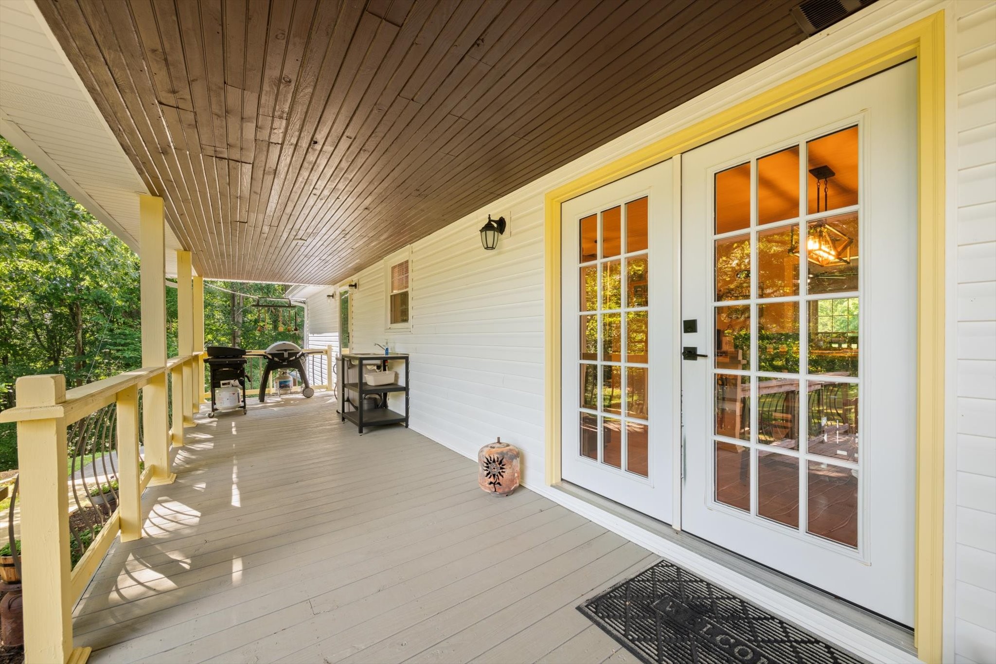 6395 Huffman Road Goodlettsville, TN 37072 - Photo 35 of 38 a view of a porch with furniture and floor to ceiling window
