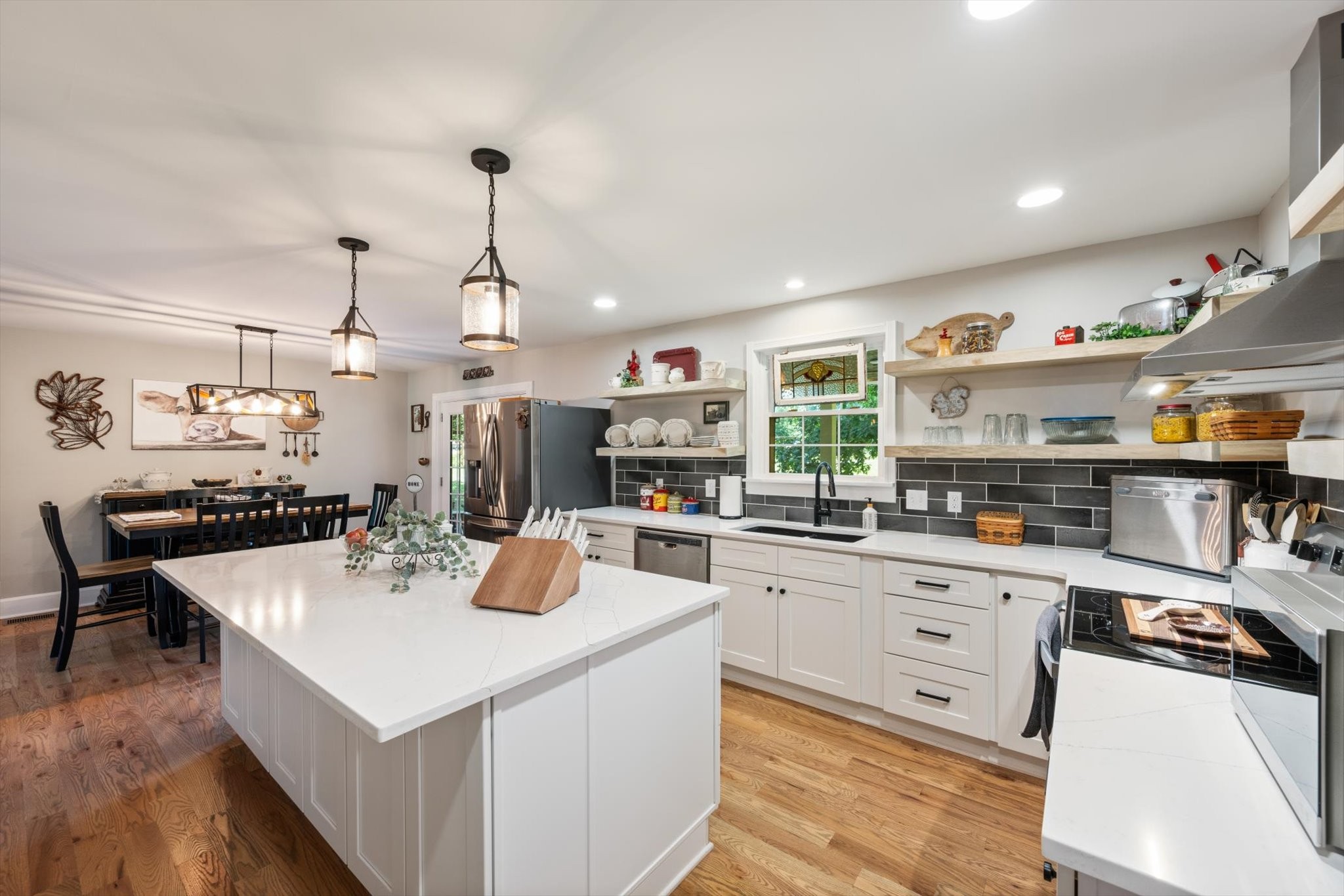 6395 Huffman Road Goodlettsville, TN 37072 - Photo 4 of 38 a kitchen that has a lot of cabinets in it