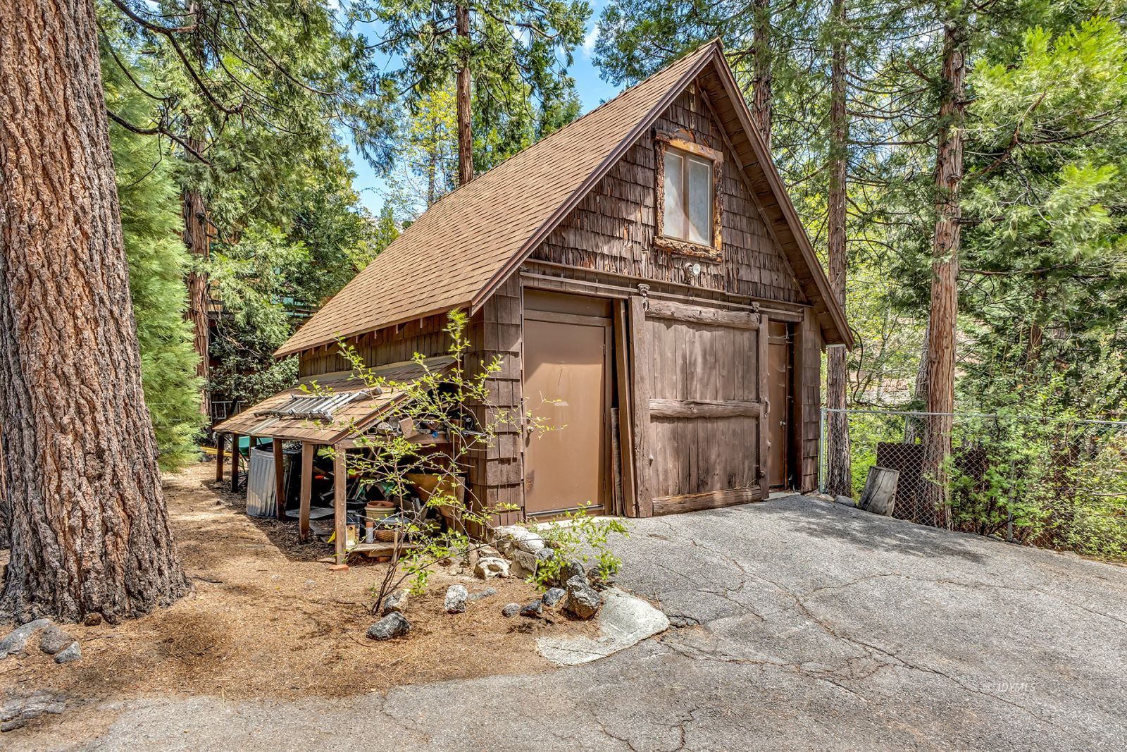 25100 Indian Rock Road Idyllwild, CA 92549 - Photo 4 of 75 a view of a house with a yard