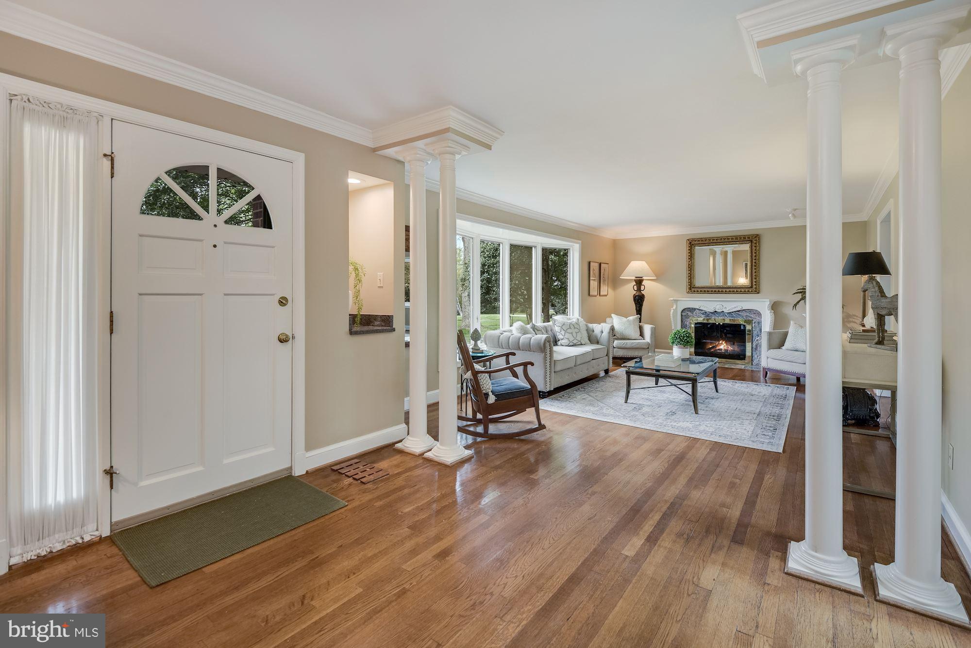 Foyer opening to living room