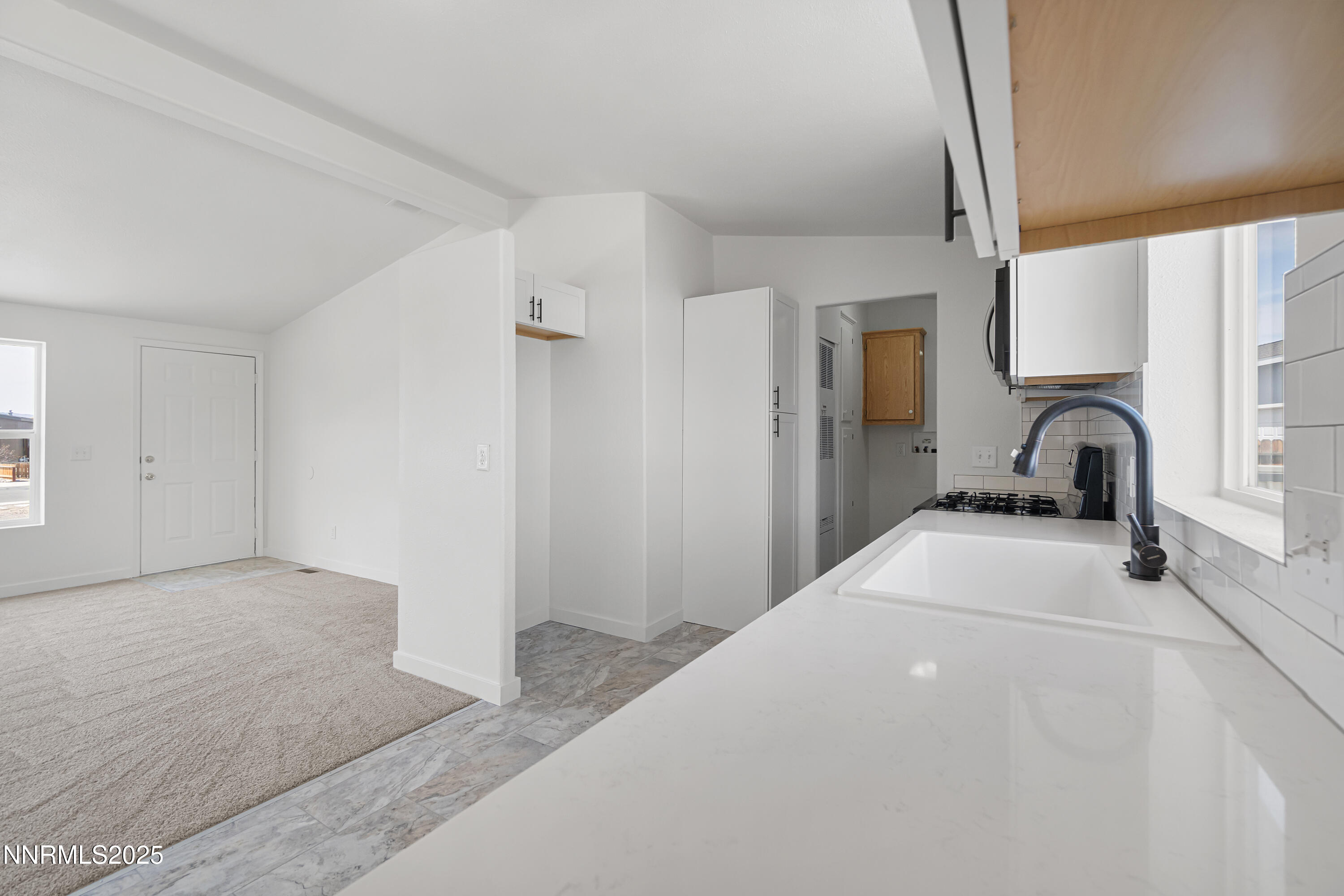 863 Jennys Lane Fernley, NV 89408 - Photo 12 of 24 a bedroom with a bed and a dresser