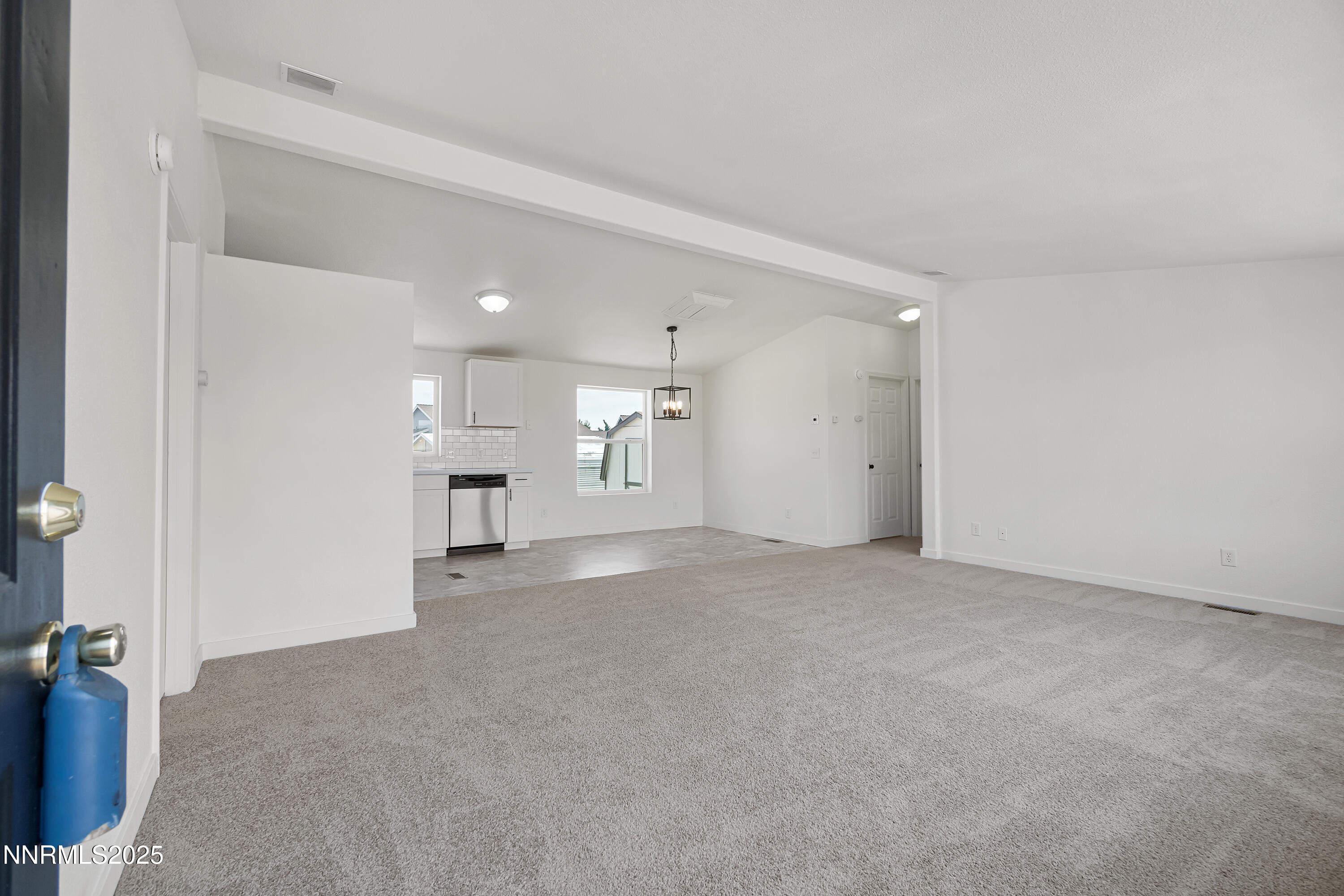 863 Jennys Lane Fernley, NV 89408 - Photo 6 of 24 a view of empty room with a fireplace