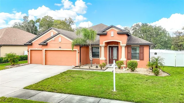 a view of a door and chair in a room