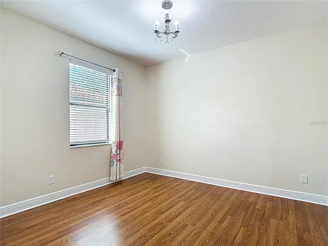 a view of a backyard of the house