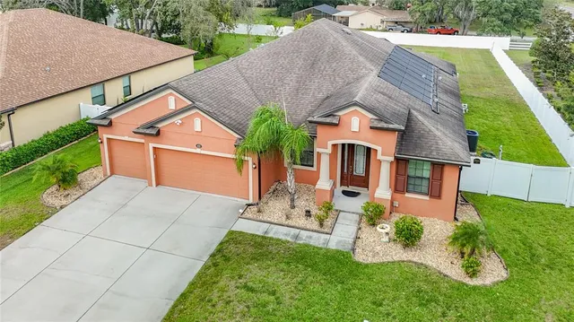 a kitchen with granite countertop cabinets stainless steel appliances and a sink
