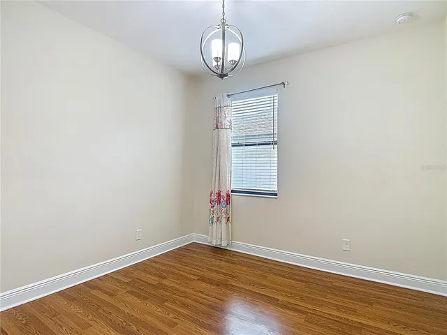 a front view of house with yard and entertaining space