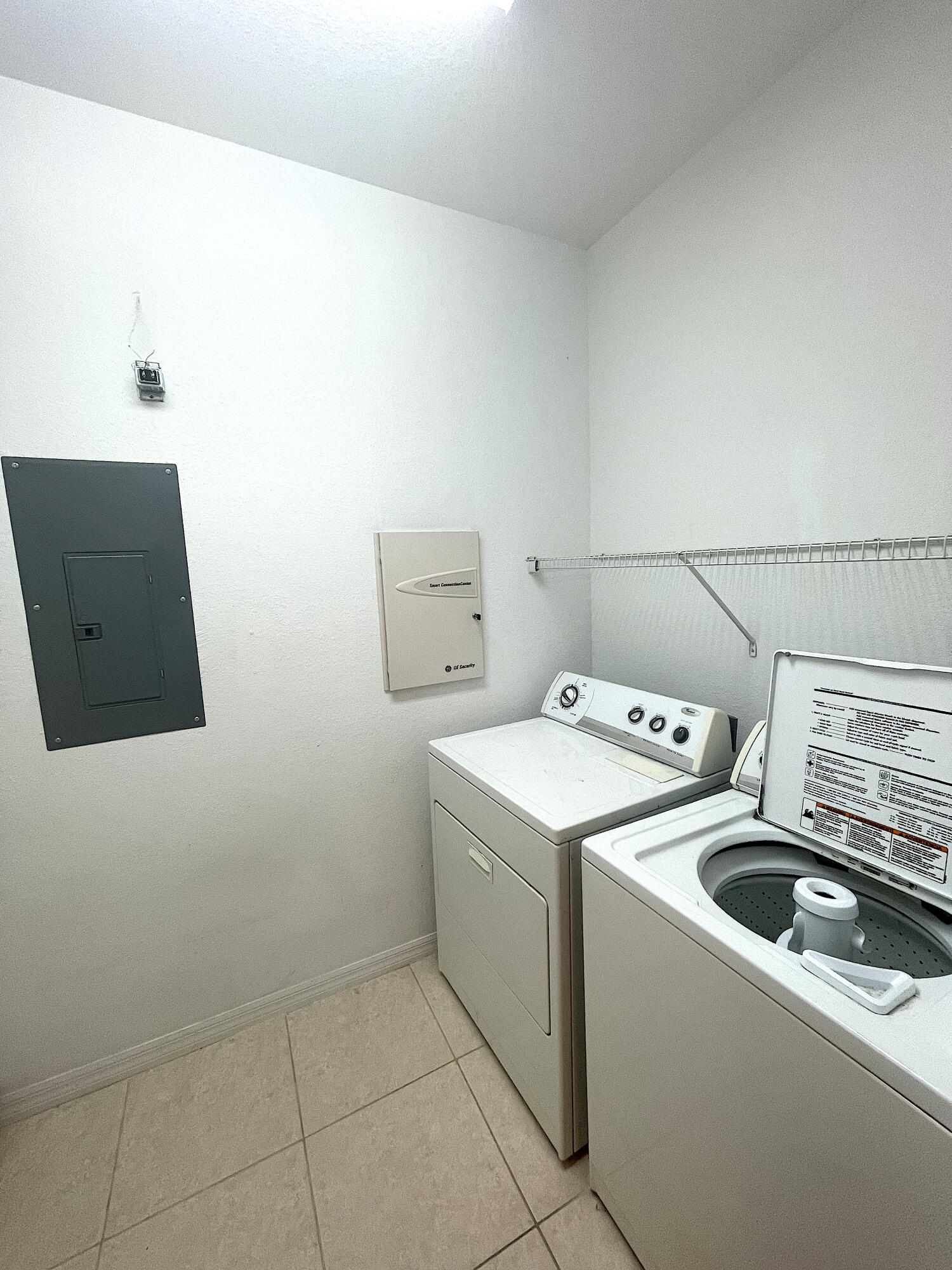 1791 Lakefront Boulevard, Unit 1 Fort Pierce, FL 34982 - Photo 7 of 14 a utility room with dryer and washer