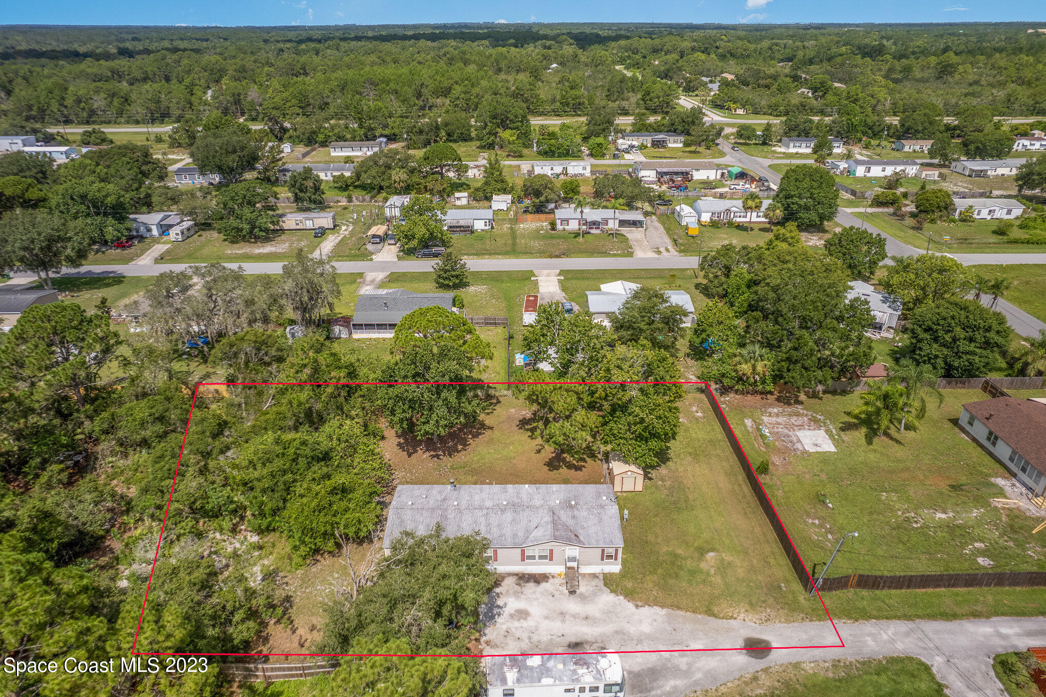 823 Phyllis Way Cocoa, FL 32926 - Photo 2 of 28 an aerial view of residential houses with outdoor space