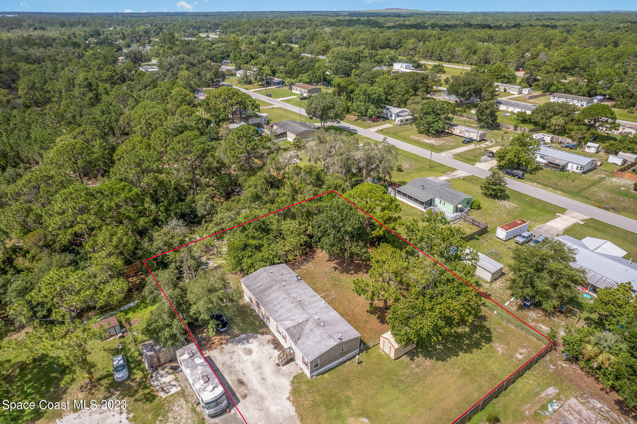 823 Phyllis Way Cocoa, FL 32926 - Photo 26 of 28 an aerial view of residential houses with outdoor space
