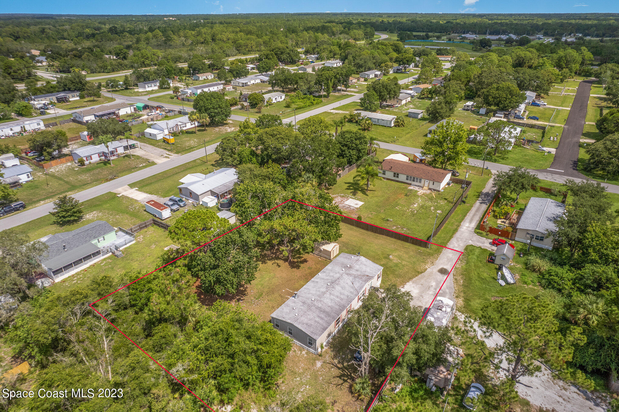 823 Phyllis Way Cocoa, FL 32926 - Photo 27 of 28 an aerial view of residential houses with outdoor space