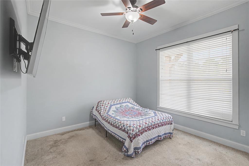 550 Ramsey Road Stonewall, LA 71078 - Photo 20 of 40 a bedroom with a bed and window