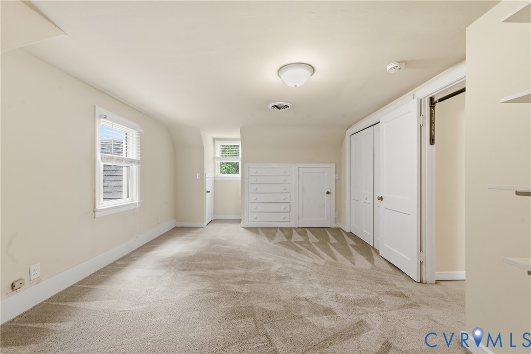 8325 Mill Creek Road West Point, VA 23181 - Photo 23 of 50 an empty room with windows