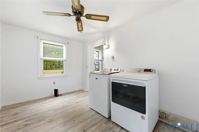 a view of utility room and washer dryer