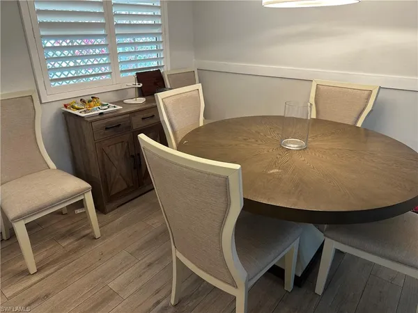 a view of a dining room with furniture