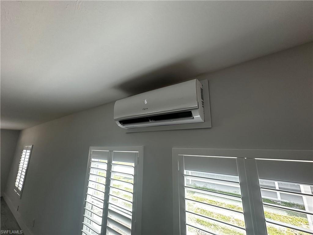 170 Pine Key Lane, Unit 13 Naples, FL 34114 - Photo 25 of 34 Detailed view of a wall mounted mini split