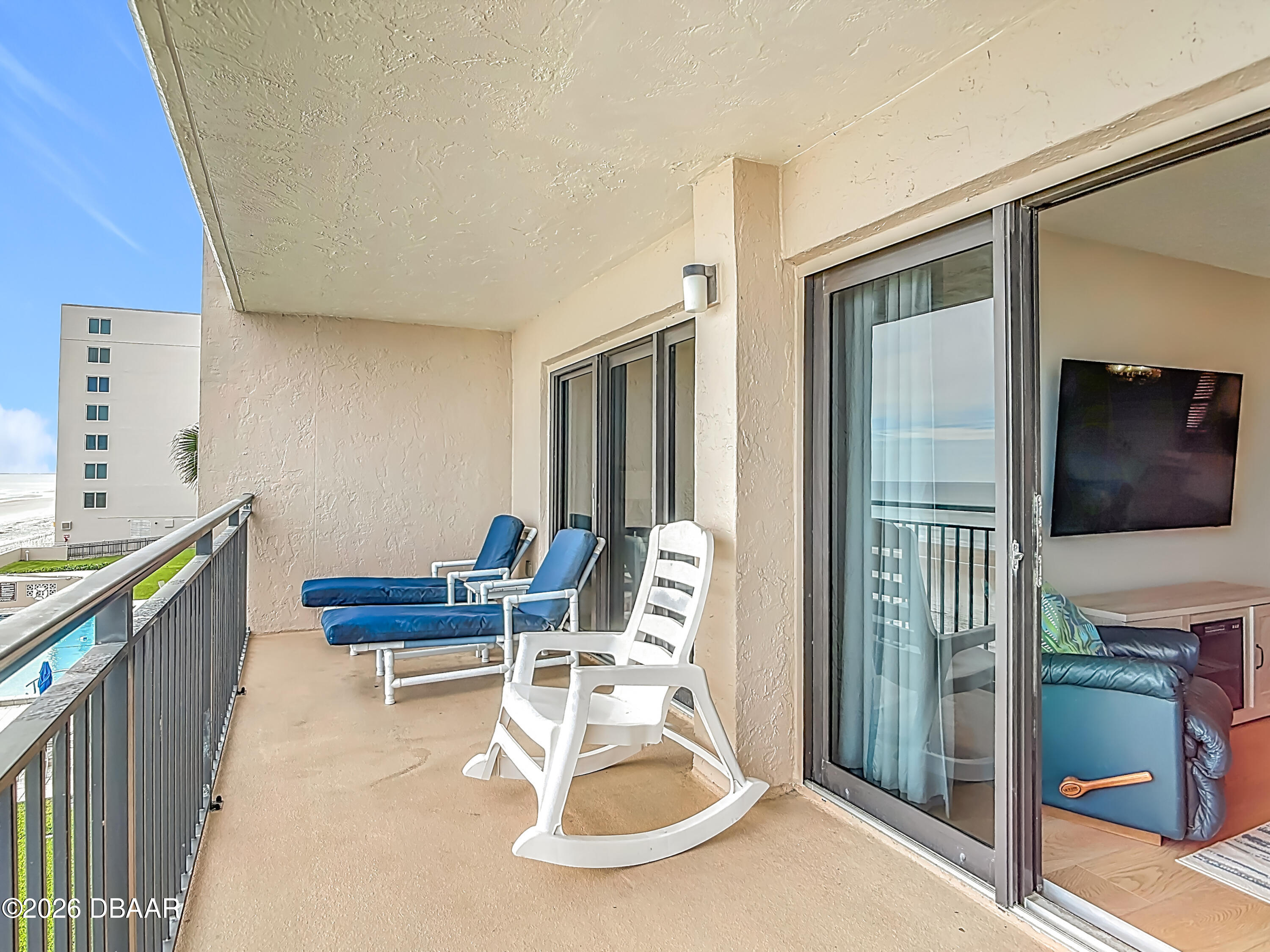 4445 South Atlantic Avenue, Unit 301 Ponce Inlet, FL 32127 - Photo 33 of 45 a room with furniture