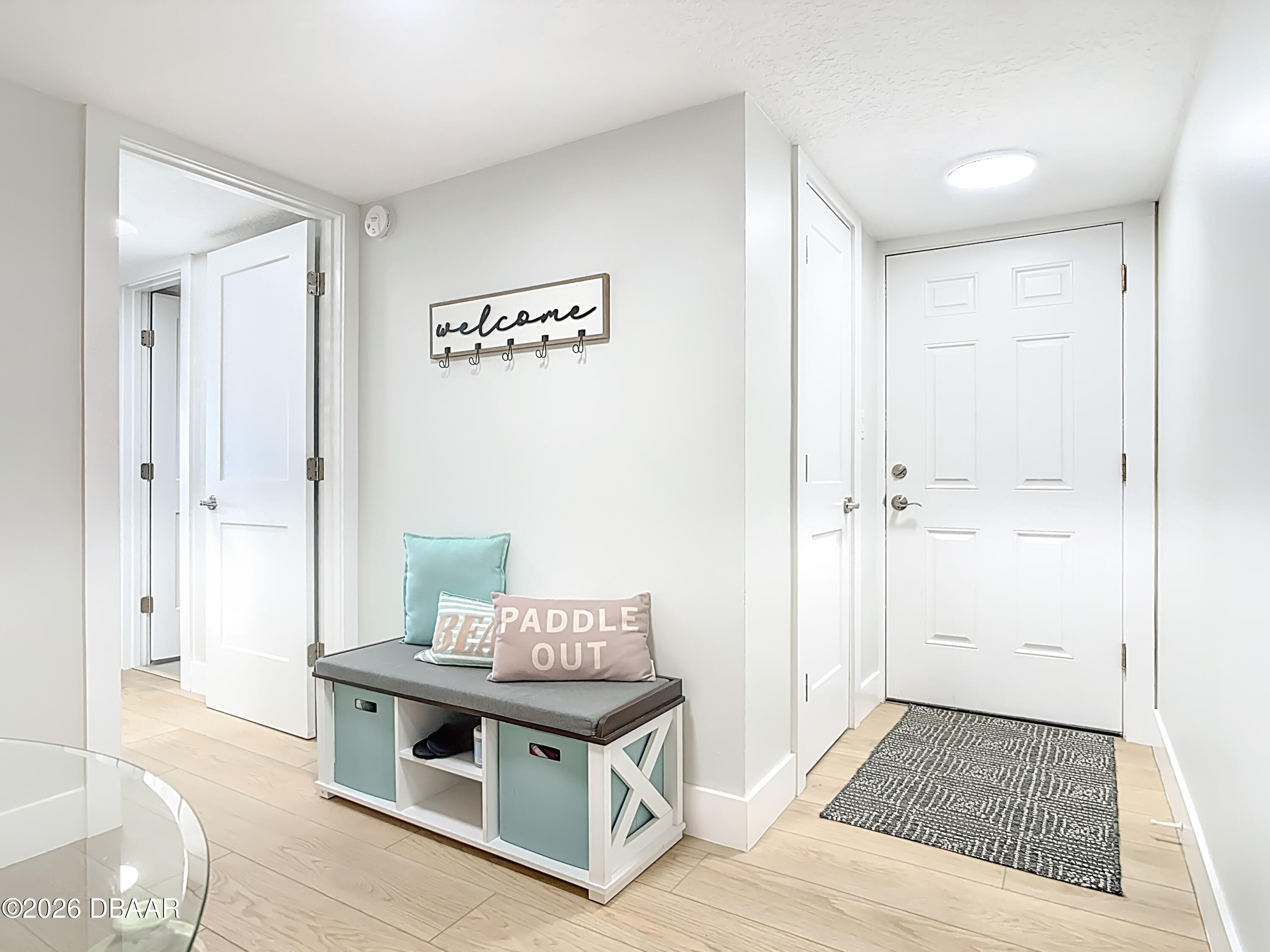 4445 South Atlantic Avenue, Unit 301 Ponce Inlet, FL 32127 - Photo 4 of 45 a view of kitchen with furniture and wooden floor