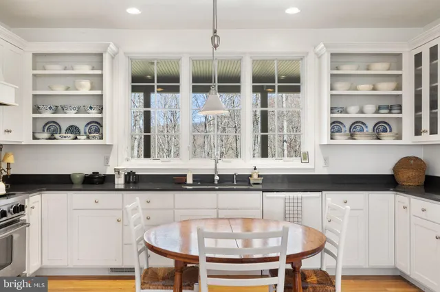 a view of room with wooden floor