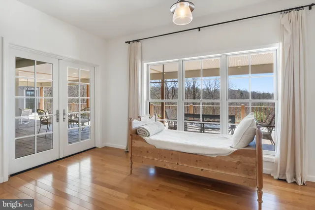 a view of outdoor space with wooden floor