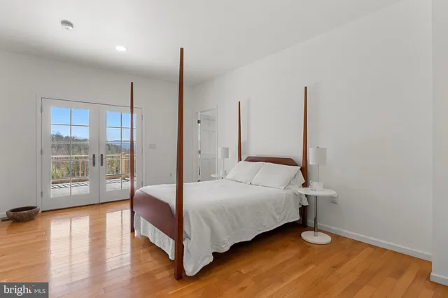 a view of a room with wooden ceiling