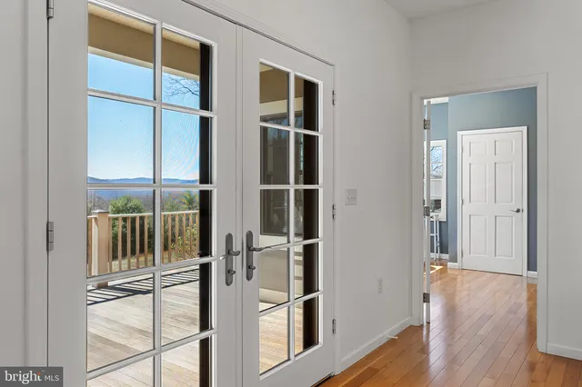 a view of a livingroom with wooden floor