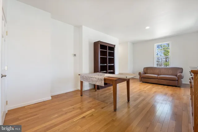 a view of a mountain range with lush green forest