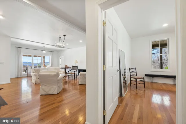 a view of a balcony with table and chairs