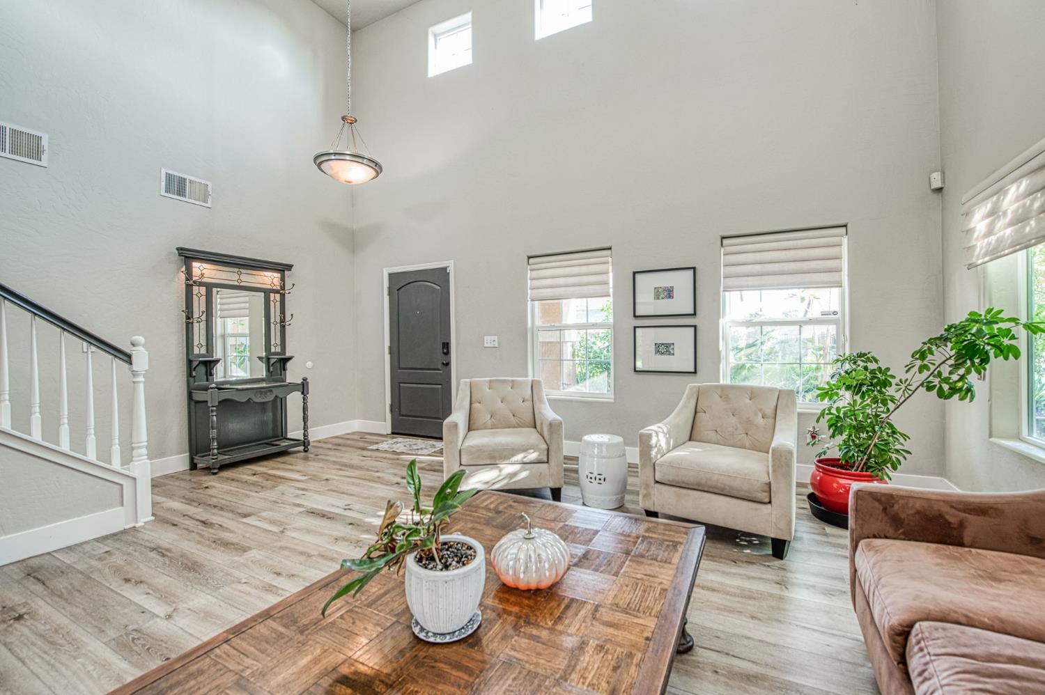 5855 East Platt Avenue Fresno, CA 93727 - Photo 17 of 57 a living room with furniture and a large window