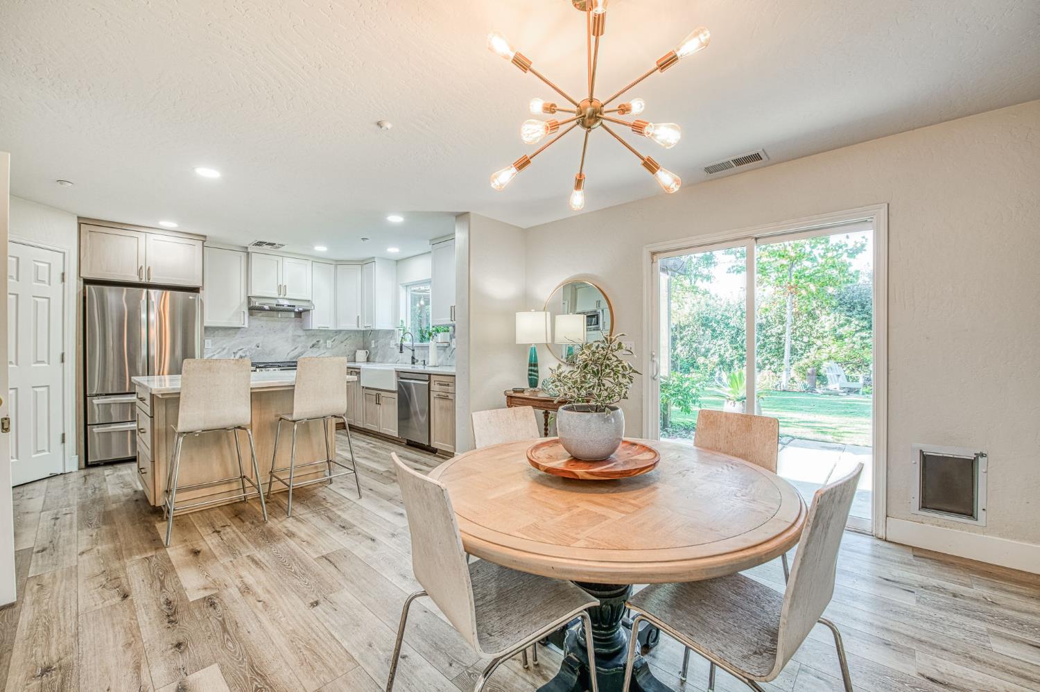 5855 East Platt Avenue Fresno, CA 93727 - Photo 27 of 57 a view of a dining room with furniture window and outside view