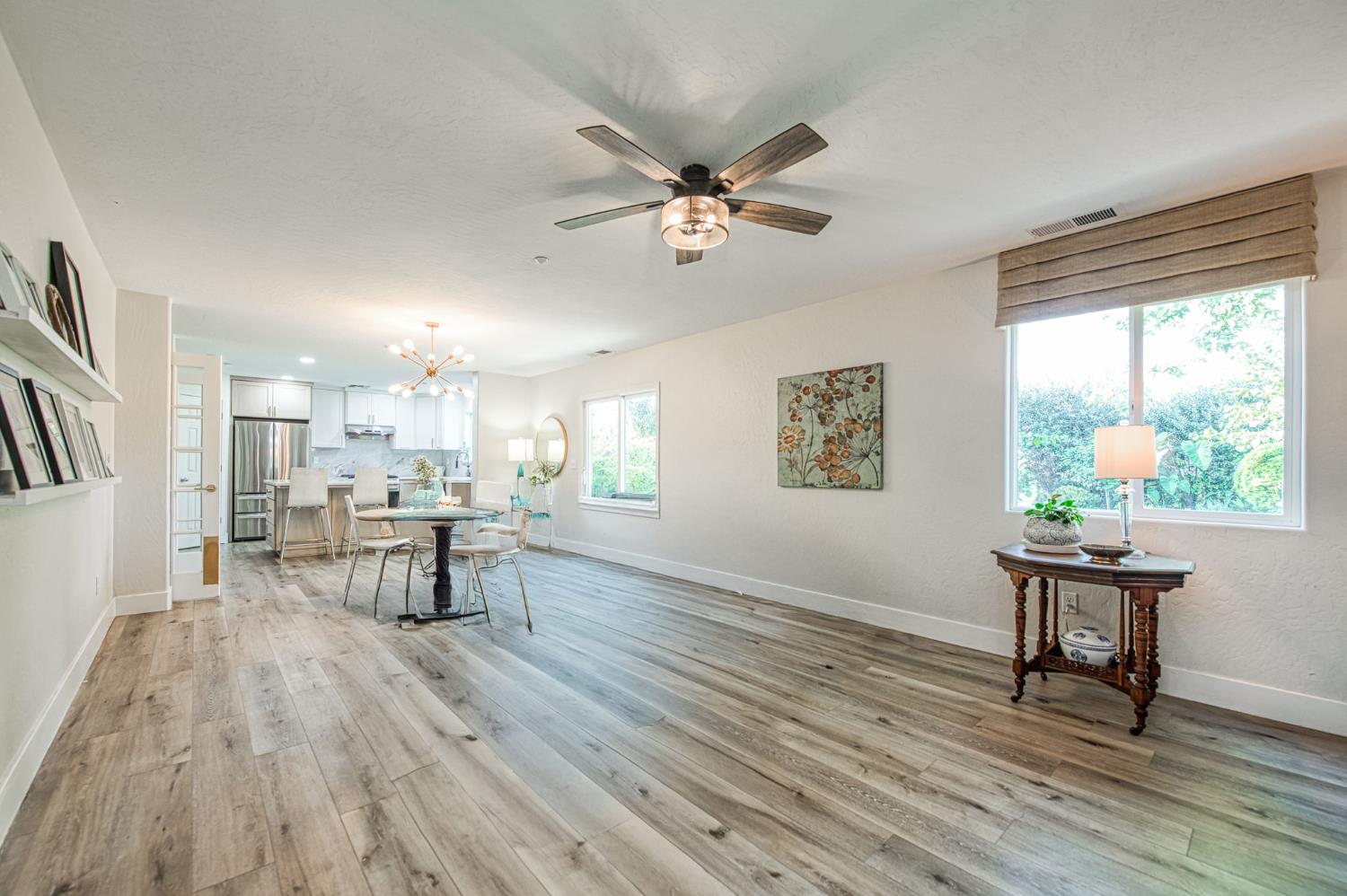 5855 East Platt Avenue Fresno, CA 93727 - Photo 36 of 57 a view of a dining room with furniture and a window