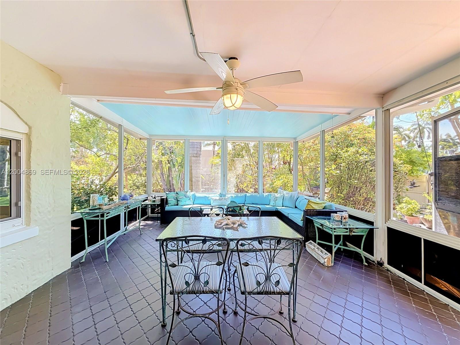 1029 Harrison Street Hollywood, FL 33019 - Photo 32 of 74 Huge screened porch overlooking pool and yard