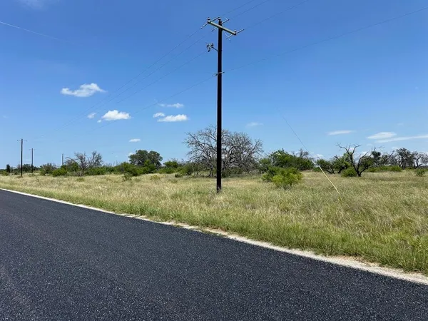 a view of a house with a big yard