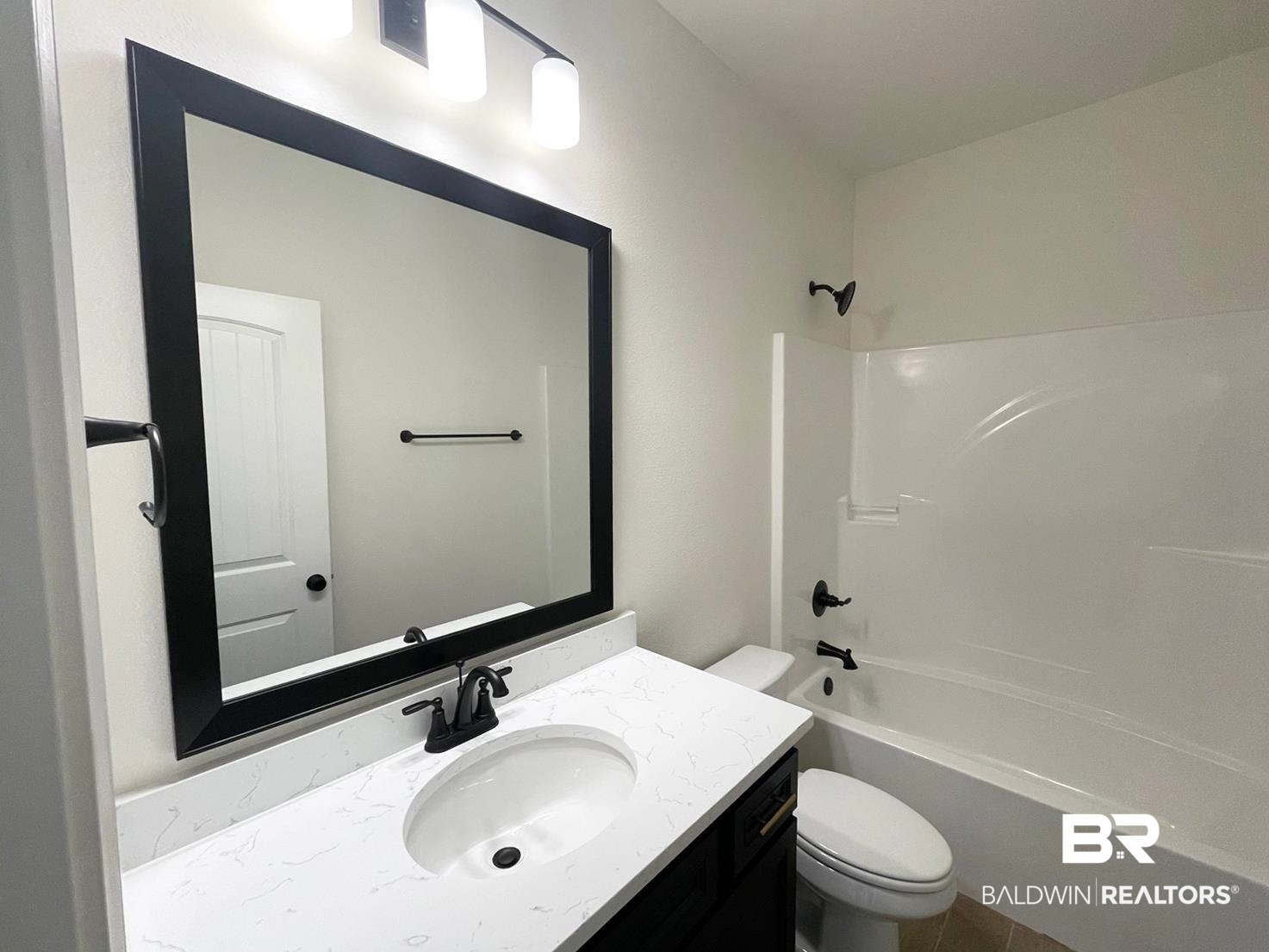 1363 Fenton Circle Foley, AL 36535 - Photo 14 of 20 Full bathroom with vanity, toilet, and shower / washtub combination