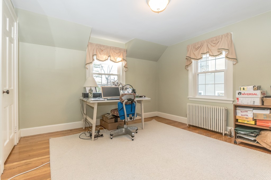 99 Hillcrest Road Needham, MA 02492 - Photo 8 of 11 a view of a workspace with furniture and a window