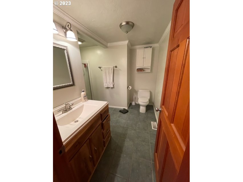 40553 Little Fall Creek Road Fall Creek, OR 97438 - Photo 16 of 28 a room with a sink and a washer