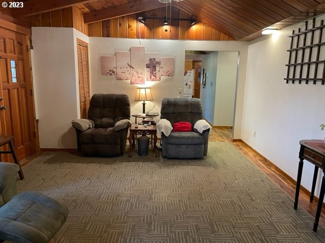 40553 Little Fall Creek Road Fall Creek, OR 97438 - Photo 10 of 28 a very nice looking room with many windows and a chandelier