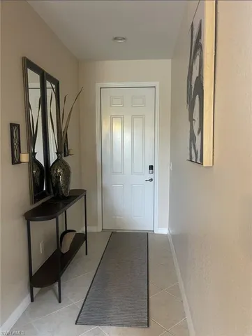 a view of a hallway with workspace