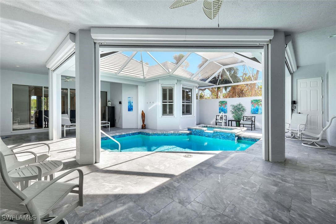 2450 Wulfert Road Sanibel, FL 33957 - Photo 39 of 44 a front view of a house with garden